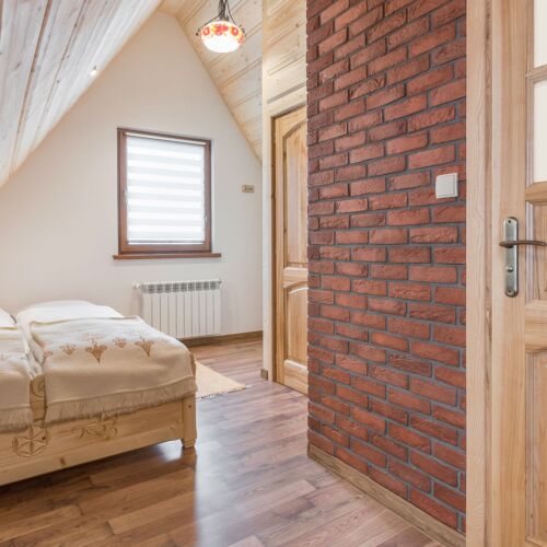 Camera dubla la mansarda cu balcon (se poate solicita pat suplimentar)