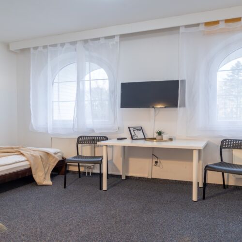 Dvoulůžkový pokoj s oddělenými postelemi a vlastní koupelnou