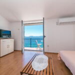 Apartament 4-osobowy na piętrze z widokiem na morze z 2 pomieszczeniami sypialnianymi