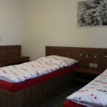 Třílůžkový pokoj s oddělenými postelemi