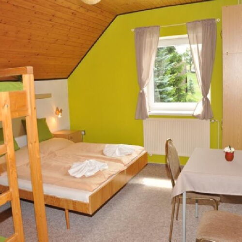 Čtyřlůžkový pokoj s palandou