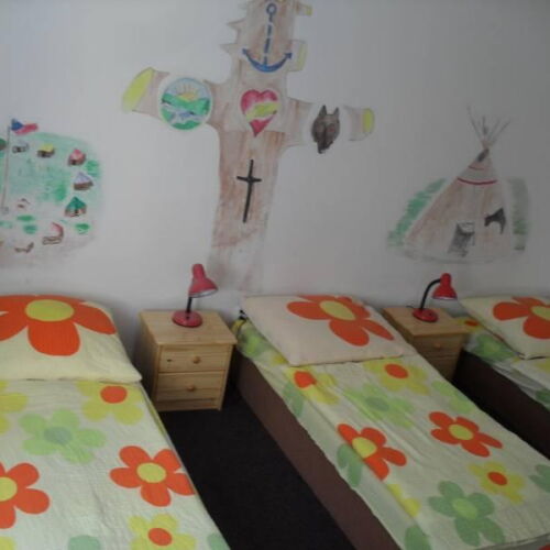 Camera cu duș cu balcon pentru 12 pers.