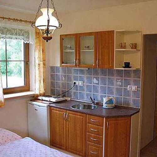 Pokoj se sprchou s vlastní kuchyňkou pro 4 os.