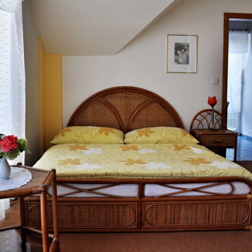 Pokoj s balkónem se sprchou s manželskou postelí (s možností přistýlky)