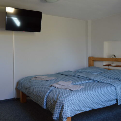 Pokoj se sprchou se společnou kuchyňkou pro 2 os.