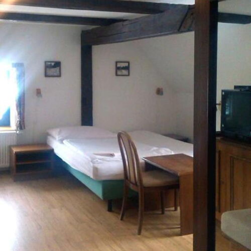 Pokoj s vlastní kuchyňkou  s manželskou postelí