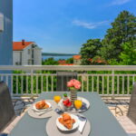 Tengerre néző emeleti 4 fős apartman 2 hálótérrel