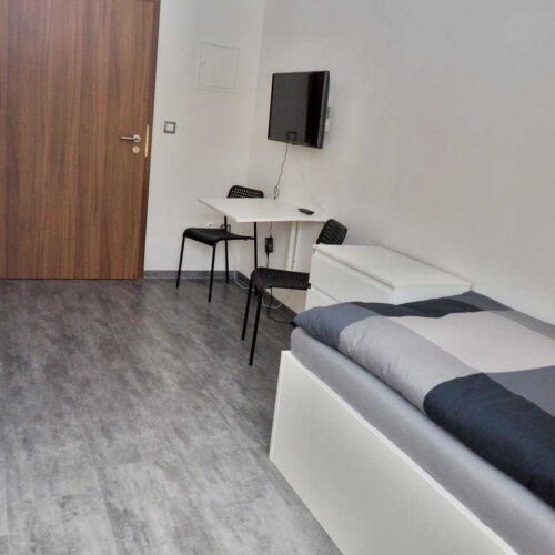 Pokoj se sprchou se společnou kuchyňkou pro 2 os.