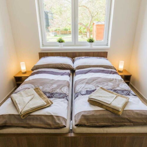 Dvoulůžkový pokoj s manželskou postelí