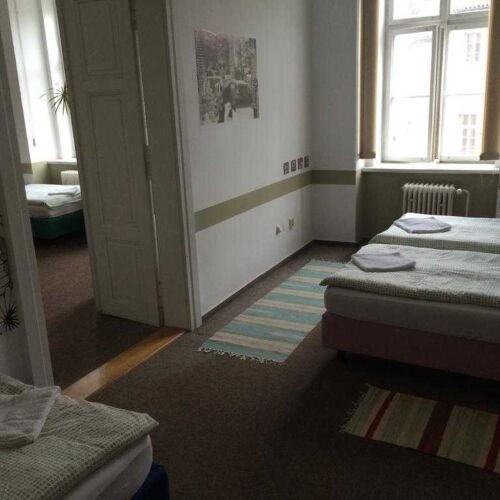 Pokoj se společnou kuchyňkou  pro 11 os.