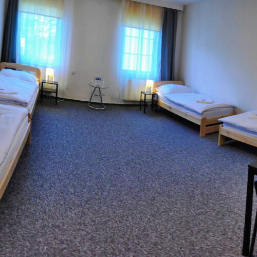 Pokoj se společnou kuchyňkou  pro 4 os.