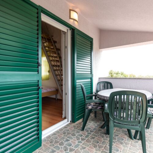 Upstairs 2-Room Air Conditioned Apartment for 4 Persons