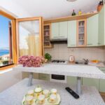 Casa de vacanta cu aer conditionat cu vedere spre mare pentru 10 pers. (se inchirieaza doar integral)
