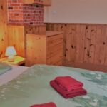 Apartman se zahradou pro 8 os. se 2 ložnicemi na poschodí