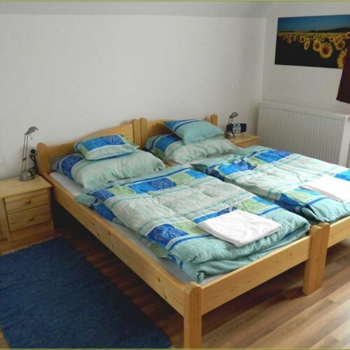 Camera tripla la etaj cu bucătărie comună