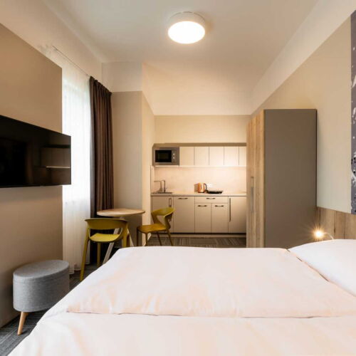 Apartman s vlastní kuchyňkou s klimatizací s manželskou postelí s 1 ložnicí