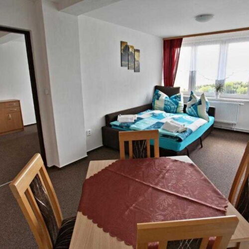 Apartament 4-osobowy z prysznicem z własną kuchnią z 2 pomieszczeniami sypialnianymi