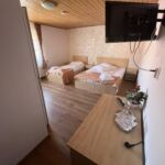 Camera tripla