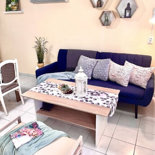 Apartament la parter cu aer condiționat cu 2 camere pentru 4 pers. (se poate solicita pat suplimentar)