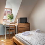 Dvoulůžkový pokoj s manželskou postelí (140cm)
