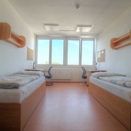 Pokoj se společnou kuchyňkou  pro 4 os.