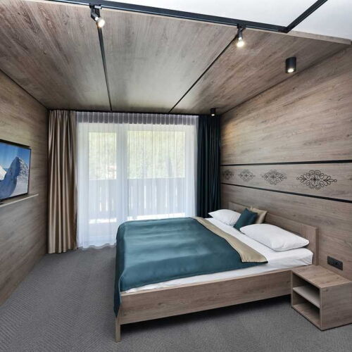 Apartament cu duș cu chicinetă proprie cu 1 camera pentru 2 pers. (se poate solicita pat suplimentar)