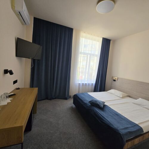 Camera tripla superior