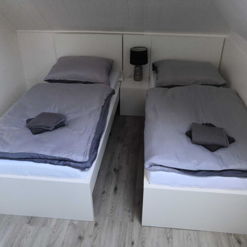 Pokoj se sprchou se společnou kuchyňkou pro 2 os.