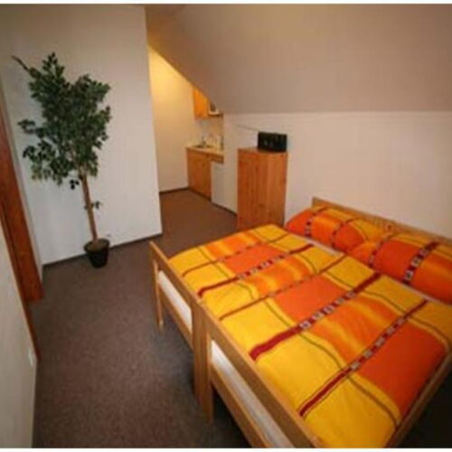 Apartman se sprchou se společnou kuchyňkou pro 4 os.