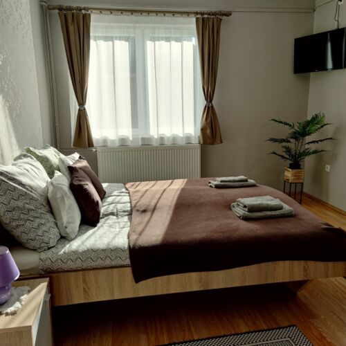 Apartament 4-osobowy na piętrze z balkonem z 2 pomieszczeniami sypialnianymi (możliwa dostawka)