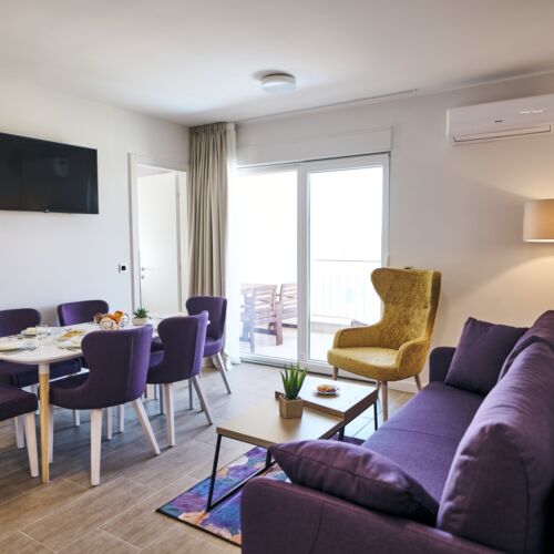 Apartament 4-osobowy z balkonem z 2 pomieszczeniami sypialnianymi