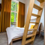Čtyřlůžkový pokoj (manželská postel + spací kout v patře))