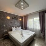 Apartament deluxe cu vedere spre grădină cu 3 camere pentru 6 pers.