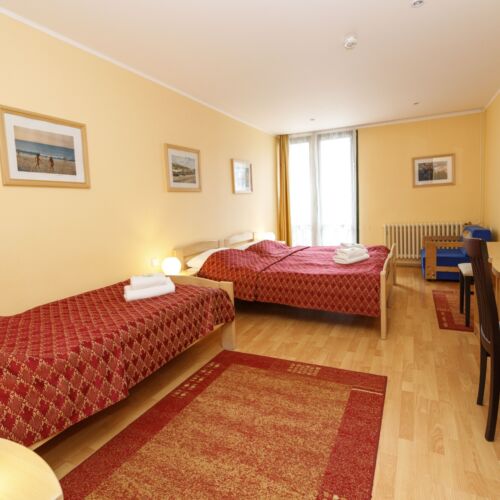 Pokój 3-osobowy na piętrze z widokiem na miasto (możliwa dostawka)