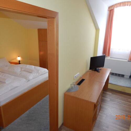 Rezydencja pokój 4-osobowy na poddaszu Przyjazny podróżom rodzinnym z 2 pomieszczeniami sypialnianymi