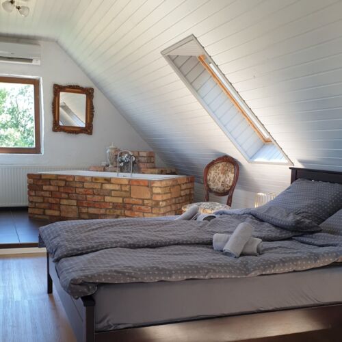 Suita cu terasa cu vedere spre lac cu 1 camera pentru 4 pers.