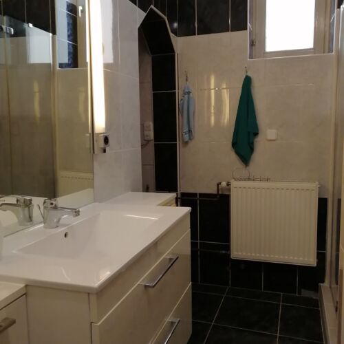 Rodinný Suita se zahradou s manželskou postelí s 1 ložnicí