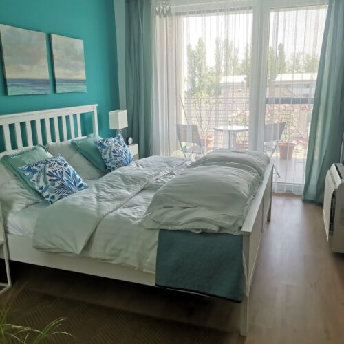 Apartament superior cu vedere spre lac cu 2 camere pentru 4 pers.