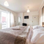 Dvoulůžkový pokoj s manželskou postelí nebo oddělenými lůžky a terasou