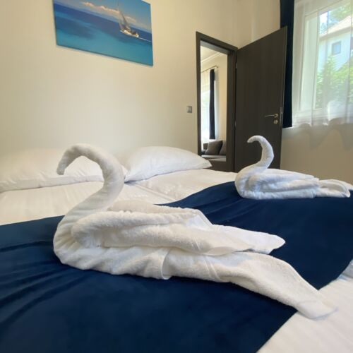 Apartament 4-osobowy na parterze z tarasem z 2 pomieszczeniami sypialnianymi