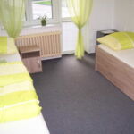 Balcony Quadruple Room with Shared Kitchenette (extra bed available)