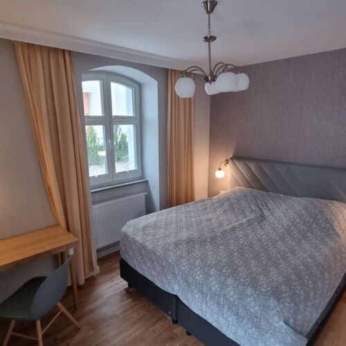 Apartament 2-osobowy na parterze z tarasem z 1 pomieszczeniem sypialnianym