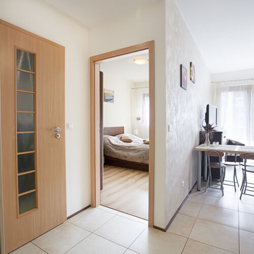 Apartament 4-osobowy na piętrze z balkonem z 2 pomieszczeniami sypialnianymi