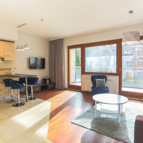 Apartament 4-osobowy na piętrze z balkonem z 2 pomieszczeniami sypialnianymi