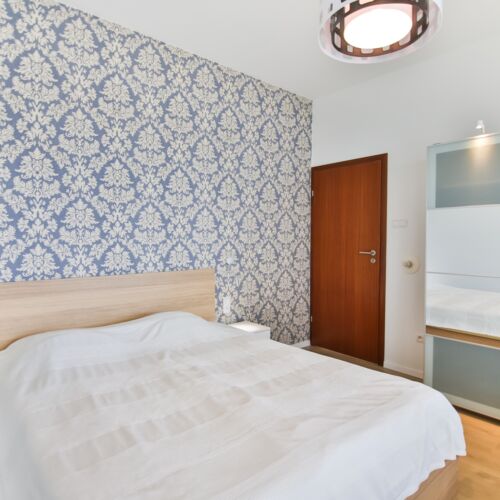 Apartament 4-osobowy na piętrze z balkonem z 2 pomieszczeniami sypialnianymi