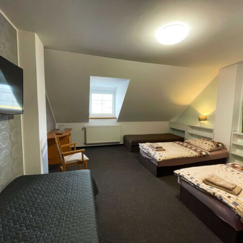 Čtyřlůžkový pokoj s oddělenými postelemi