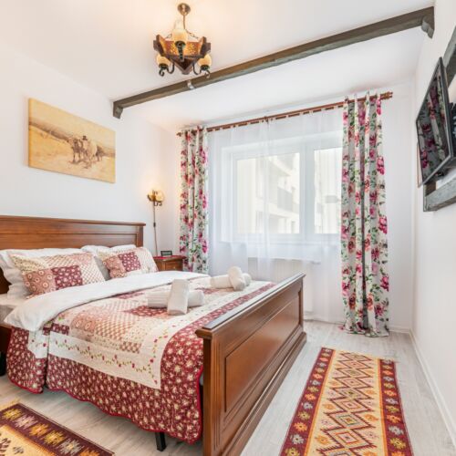 Apartman pro 4 os. se 2 ložnicemi s výhledem do zahrady na poschodí