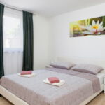 2-Zimmer-Apartment für 4 Personen Parterre mit Terasse (Zusatzbett möglich)