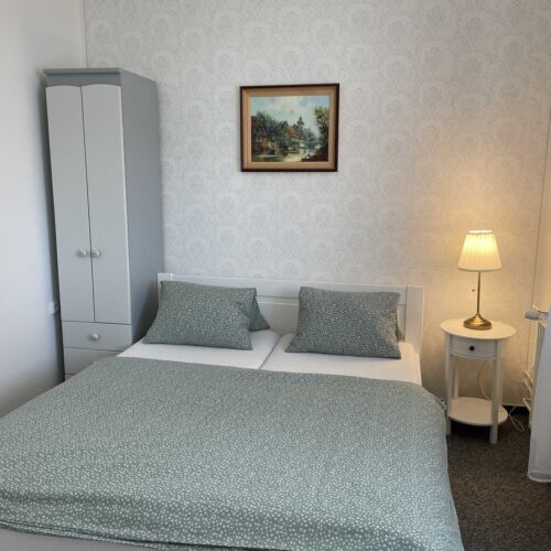 Pokoj s manželskou postelí