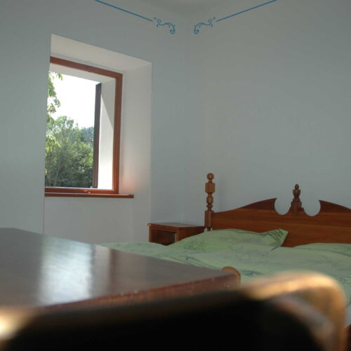 Pokoj s manželskou postelí